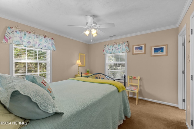 bedroom featuring carpet, crown molding, visible vents, ceiling fan, and baseboards