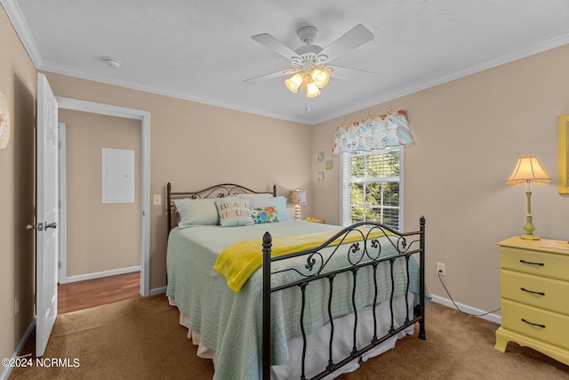 bedroom featuring ornamental molding, carpet flooring, and baseboards