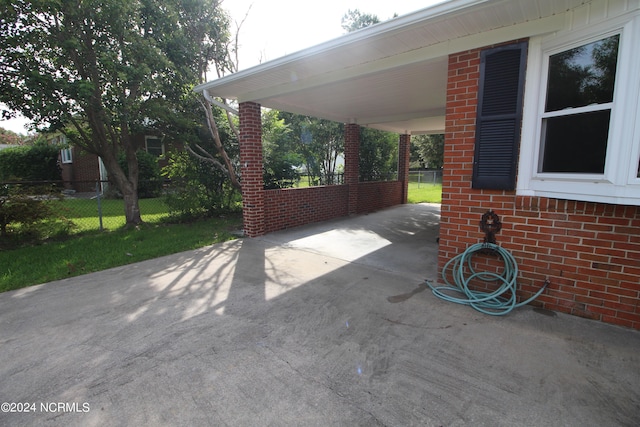 view of patio with a carport