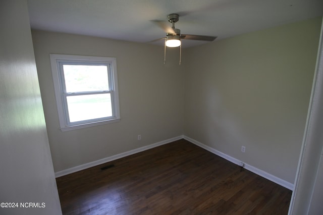 spare room featuring ceiling fan and hardwood / wood-style flooring