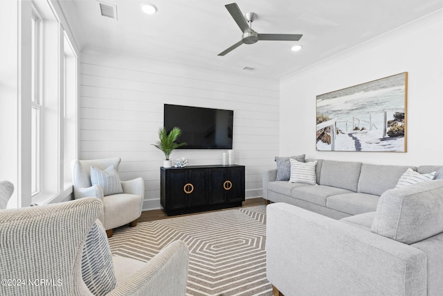 living room featuring wood-type flooring and ceiling fan