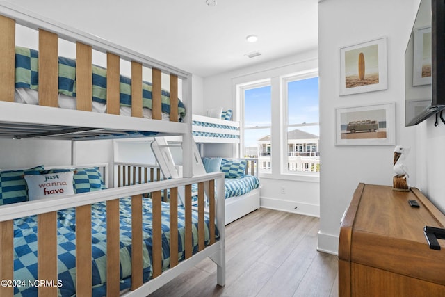 bedroom with light wood-type flooring