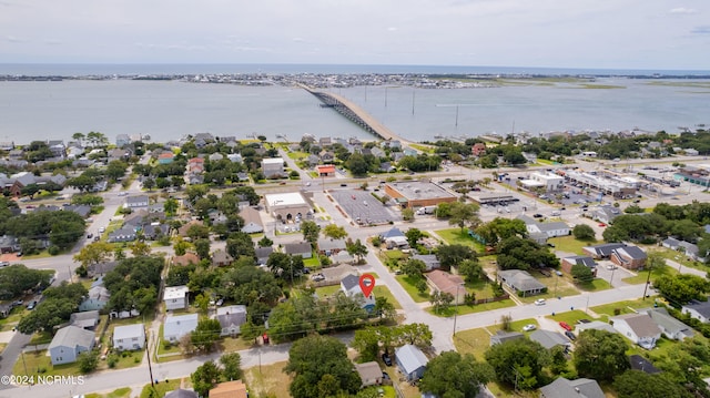 drone / aerial view with a water view