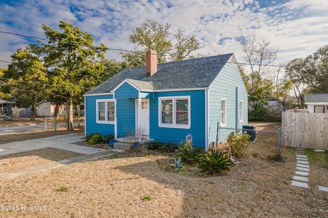 bungalow with central AC unit