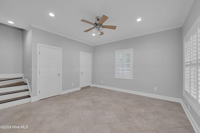 unfurnished bedroom with ceiling fan and ornamental molding