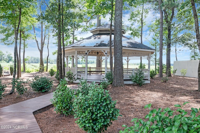 exterior space with a gazebo and a wooden deck