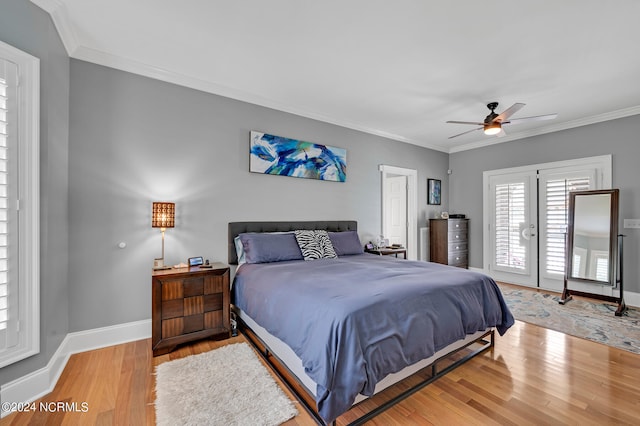 bedroom with ornamental molding, french doors, light hardwood / wood-style floors, and ceiling fan