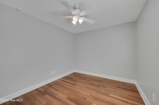 unfurnished room featuring ceiling fan and light wood-type flooring