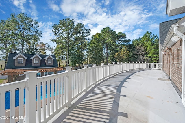 view of patio featuring a pool