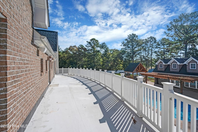 view of patio / terrace with a pool