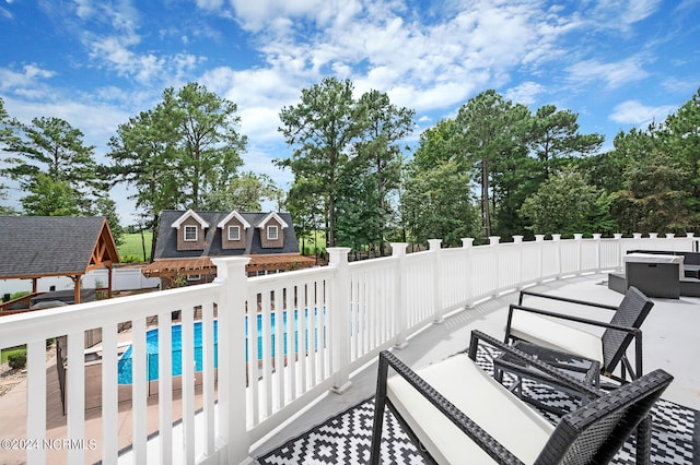 view of swimming pool with a patio area