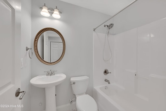 full bathroom featuring tub / shower combination, toilet, and sink