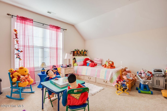 bedroom featuring carpet flooring and lofted ceiling