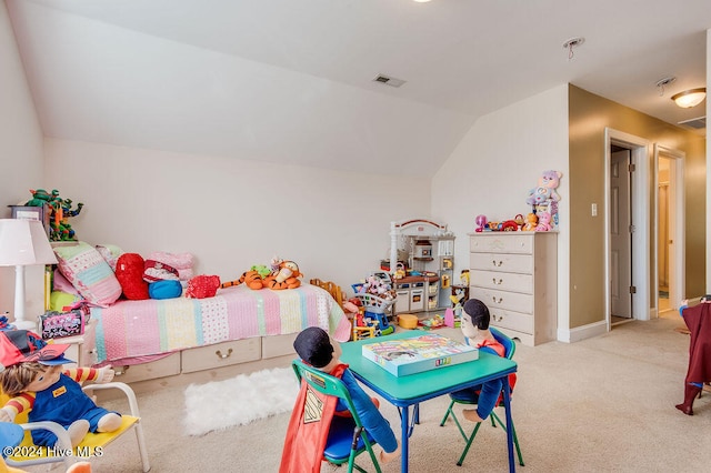 carpeted bedroom featuring lofted ceiling