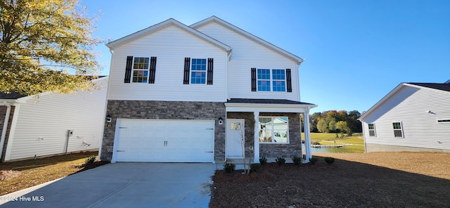 view of front of property featuring a garage