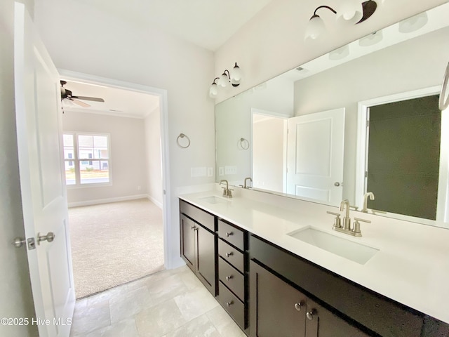 bathroom featuring vanity and ceiling fan