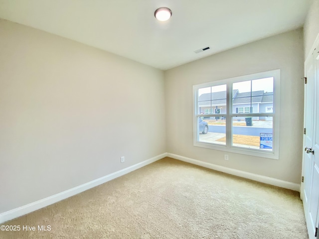 view of carpeted spare room