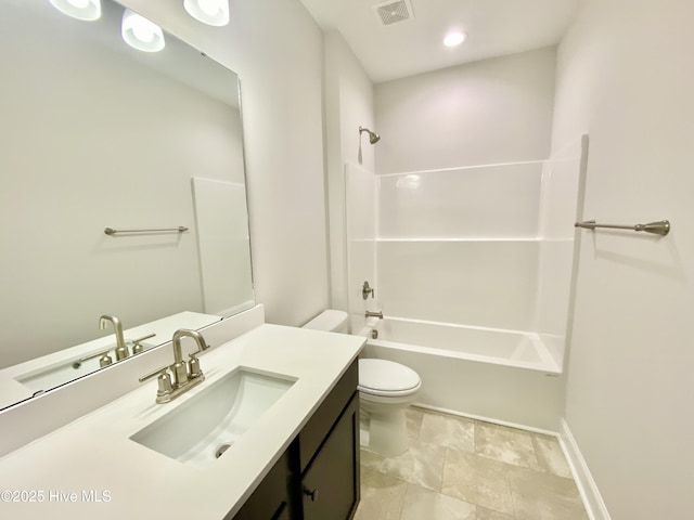 full bathroom featuring toilet, vanity, and bathtub / shower combination