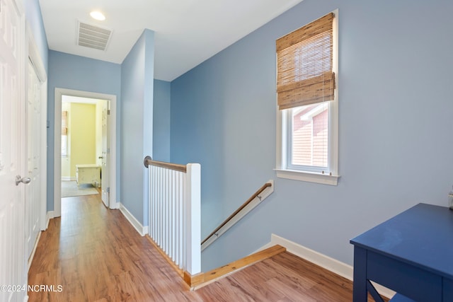 hallway featuring light hardwood / wood-style floors