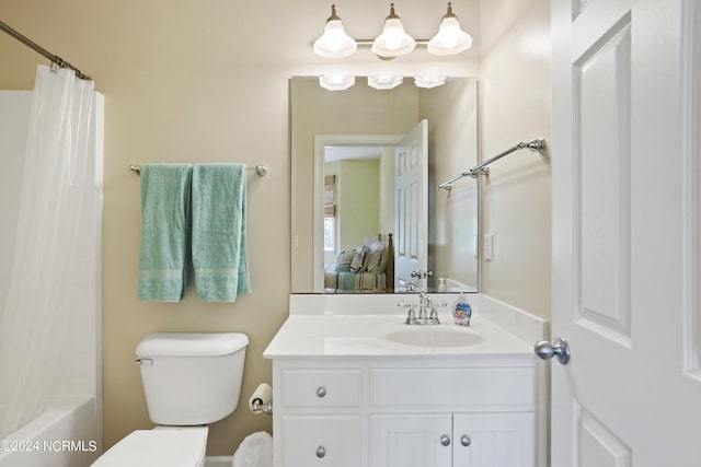 ensuite bathroom featuring shower / bathtub combination with curtain, vanity, toilet, and connected bathroom