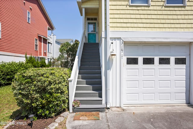 property entrance with a garage