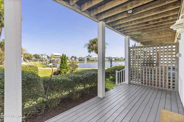 drone / aerial view featuring a water view and a residential view