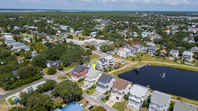 aerial view featuring a water view and a residential view