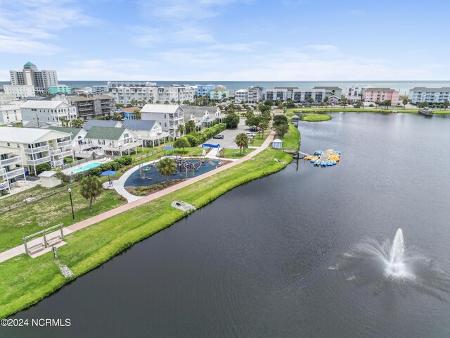 aerial view with a water view and a residential view