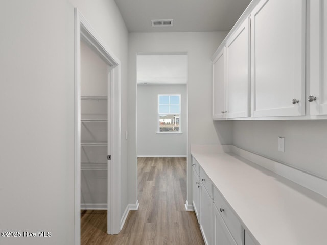 hall featuring light hardwood / wood-style floors