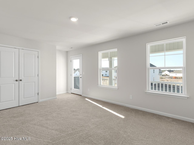 view of carpeted spare room