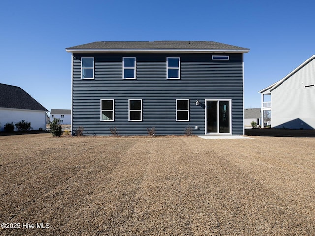 rear view of house with a patio