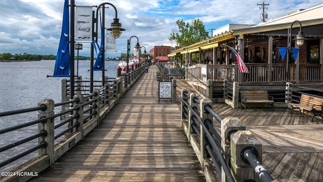 dock area featuring a water view