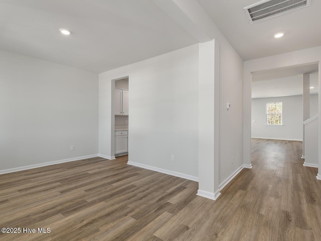 unfurnished room featuring wood-type flooring