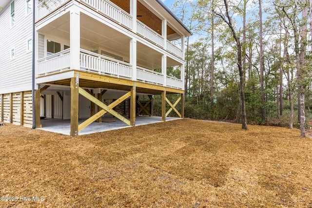 rear view of property with a patio area