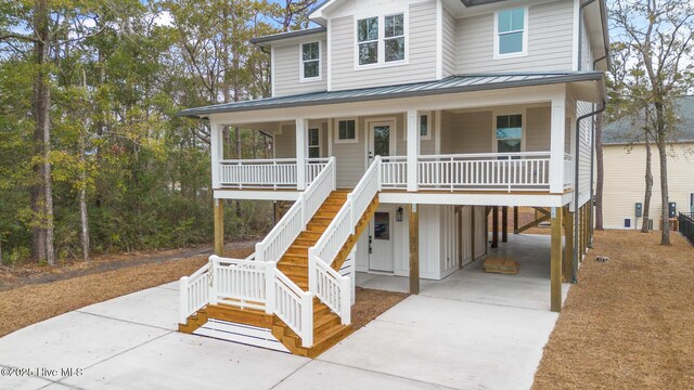 coastal home featuring a porch