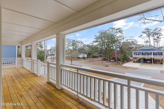 wooden terrace with covered porch