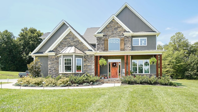 craftsman-style home with a front yard and a porch