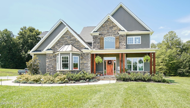 craftsman-style home featuring a front yard