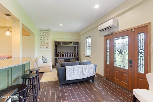 entryway featuring a wall mounted AC