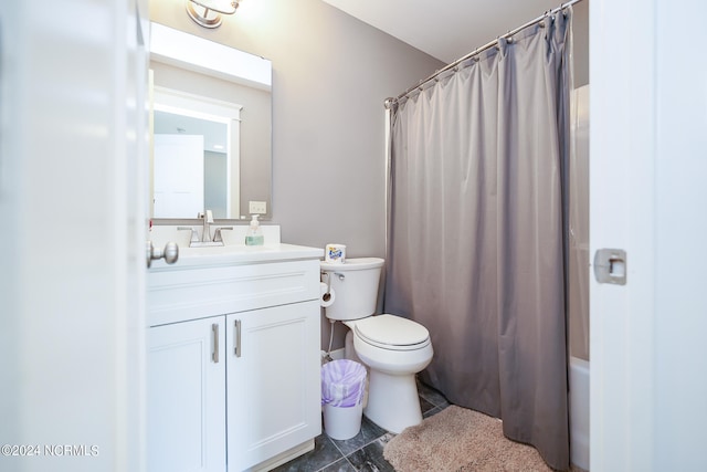 full bathroom featuring shower / tub combo, vanity, and toilet