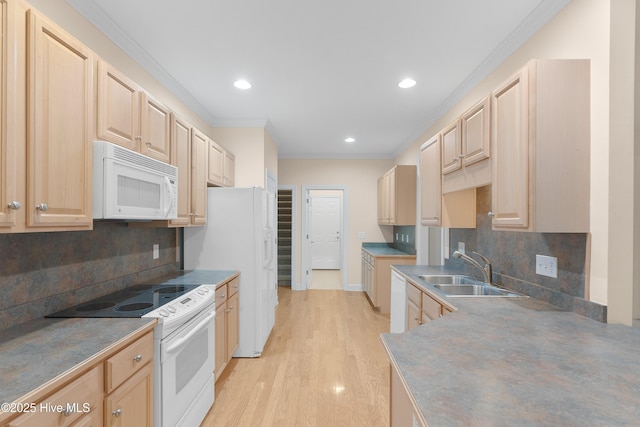 2788 Creek Bridge Ct, Southport, NC 28461 - kitchen with white appliances, light brown cabinets, a sink, crown molding, and light wood-type flooring