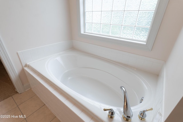 2788 Creek Bridge Ct, Southport, NC 28461 - bathroom featuring a garden tub and tile patterned floors