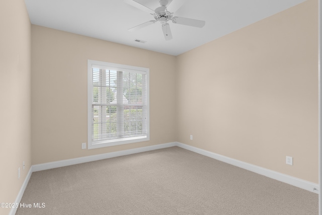 2788 Creek Bridge Ct, Southport, NC 28461 - carpeted empty room with baseboards and ceiling fan