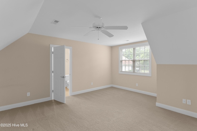 2788 Creek Bridge Ct, Southport, NC 28461 - additional living space featuring ceiling fan, light colored carpet, lofted ceiling, and baseboards
