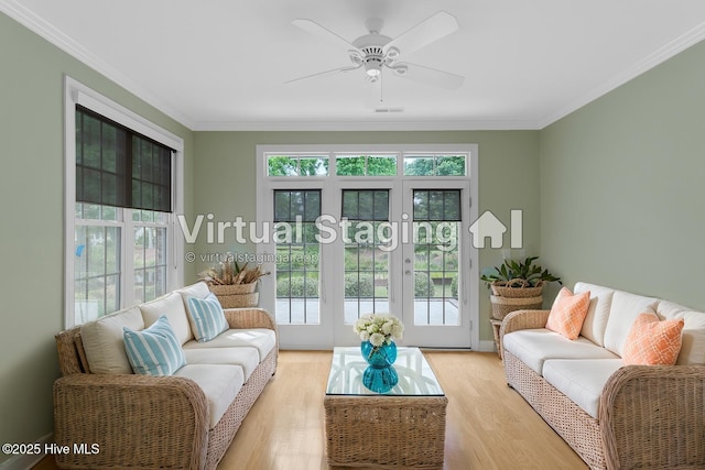 2788 Creek Bridge Ct, Southport, NC 28461 - living room featuring ornamental molding, light wood finished floors, and ceiling fan