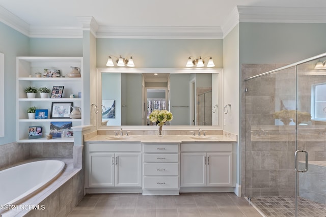 bathroom featuring tile patterned floors, vanity, separate shower and tub, and crown molding