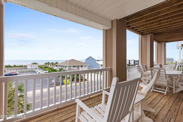 deck featuring a water view