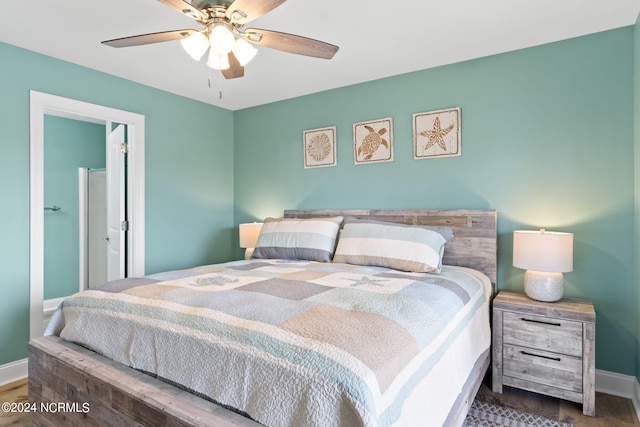 bedroom with hardwood / wood-style flooring and ceiling fan