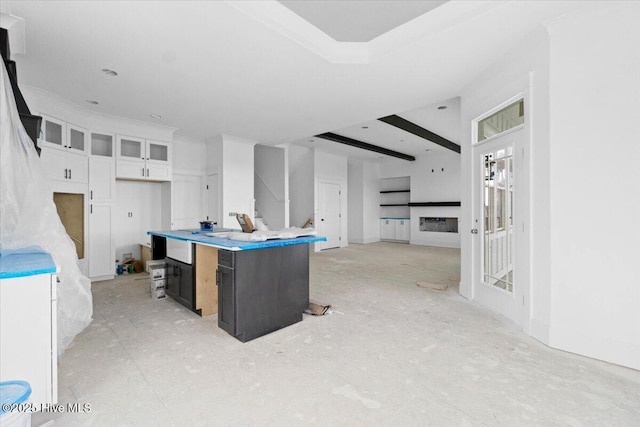 kitchen featuring white cabinetry and a center island