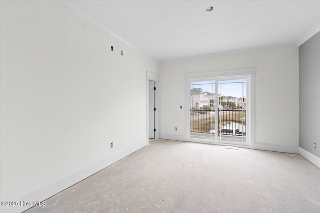 unfurnished room featuring ornamental molding